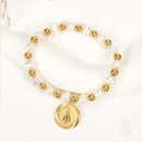 Catholic Town Bracelet, stainless steel Virgen de la Caridad del Cobre medal, natural pearl and stainless steel beads.