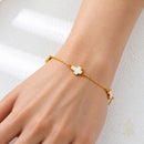 Catholic Town Gold-Tone Stainless Steel Adjustable Bracelet with 3 Mother-of-Pearl Crosses ( CTSSB3CROSSN-G )
