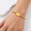 Catholic Town Our Lady of Charity Gold-Tone Stainless Steel Adjustable Bracelet