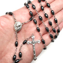 Catholic Town Rosary Necklace with oval Hematite Beads, Jerusalem Holy Soil center piece and Cross Crucifix ( ROSJSHSM-BLK )