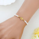 Catholic Town elastic Bracelet with stainless steel Virgen de la Caridad del Cobre medal and 4mm white beads (  SSBCMWP-4 )