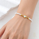 Catholic Town Bracelet with stainless steel cross and 4mm round white beads ( SSBCROSSMWPN-4G )