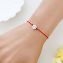 Catholic Town St Benedict inspirational adjustable red cord bracelet, available with Gold or Silver medals